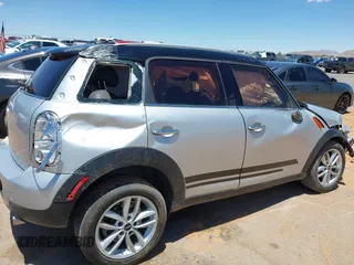 2014 MINI Countryman with VIN WMWZB3C53EWR40742, listed as a IAAI auction lot 42384059 with Not provided miles and . Bid and sale history available at DreamBid. Image 13.