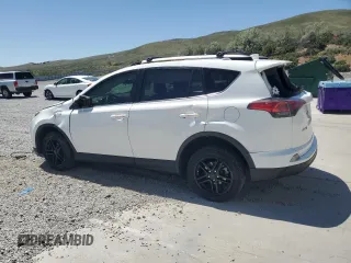 2018 Toyota RAV4 LE z VIN JTMBFREV2JD253105, wystawiony jako Copart lot #58011225 z przebiegiem 68 130 mil mil oraz Szkoda całkowita • Salvage title. Historia ofert i sprzedaży dostępna na DreamBid. Obrazek 2.