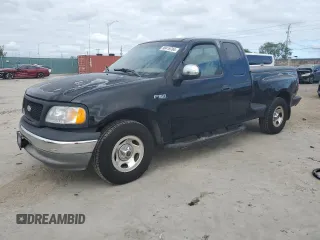 2002 Ford F-150 XL with VIN 2FTRX07222CA18022, listed as a Copart auction lot 80419784 with 283,975 mi miles and Salvage title. Bid and sale history available at DreamBid. Image 1.