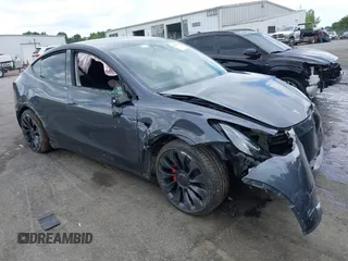 2023 Tesla Model Y Performance z VIN 7SAYGDEF2PF845353, wystawiony jako IAAI lot #42179090 z przebiegiem 32 504 mil mil oraz . Historia ofert i sprzedaży dostępna na DreamBid. Obrazek 1.