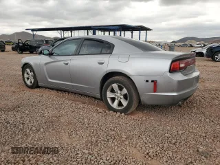 2013 Dodge Charger SE z VIN 2C3CDXBG2DH654105, wystawiony jako Copart lot #56041455 z przebiegiem 198 926 mil mil oraz Szkody całkowita. Historia ofert i sprzedaży dostępna na DreamBid. Obrazek 2.