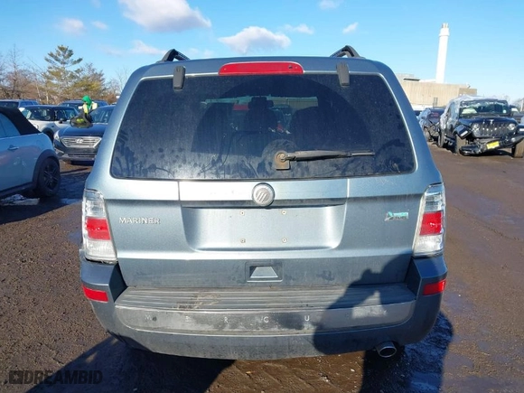 2010 Mercury Mariner with VIN 4M2CN9BG0AKJ02637, listed as a IAAI auction lot 41579241 with 128,095 mi miles. Bid and sale history available at carsss.com. Image 16.