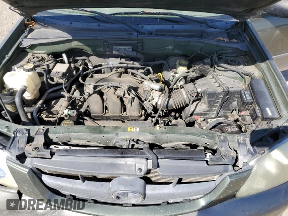 2002 Mazda Tribute LX with VIN 4F2YU09122KM62196, listed as a Copart auction lot 77327034 with 256,385 mi miles and Salvage Title. Bid and sale history available at carsss.com. Image 13.