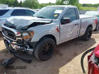 2023 Ford F-150 XL with VIN 1FTMF1C53PKF34184, listed as a IAAI auction lot 42242703 with 27,312 mi miles and . Bid and sale history available at DreamBid. Image 19.