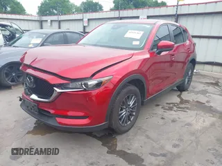 2019 Mazda CX-5 Touring with VIN JM3KFACM7K0696815, listed as a IAAI auction lot 41921763 with 46,900 mi miles. Bid and sale history available at carsss.com. Image 22.