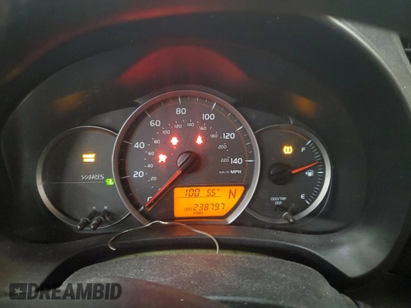 2012 Toyota Yaris L with VIN JTDKTUD32CD532746, listed as a Copart auction lot 51666455 with 238,797 mi miles and Salvage Title. Bid and sale history available at carsss.com. Image 9.