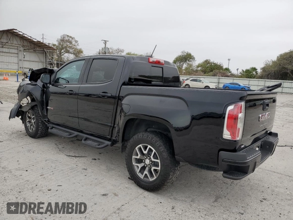 2022 GMC Canyon 4WD AT4 w/Leather with VIN 1GTG6FEN2N1294071, listed as a Copart auction lot 84652954 with 53,076 mi miles and Salvage Title. Bid and sale history available at carsss.com. Image 2.