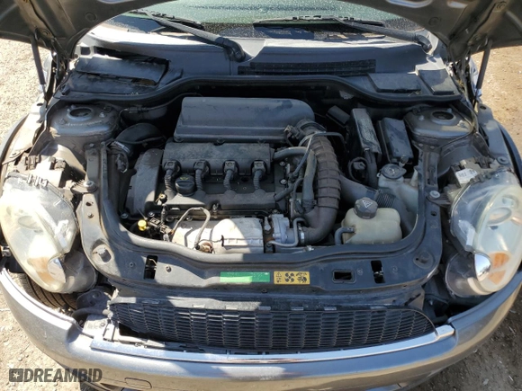 2010 MINI Cooper Hardtop S with VIN WMWMF7C54ATZ69166, listed as a Copart auction lot 51706945 with 127,139 mi miles and Salvage Title. Bid and sale history available at carsss.com. Image 11.