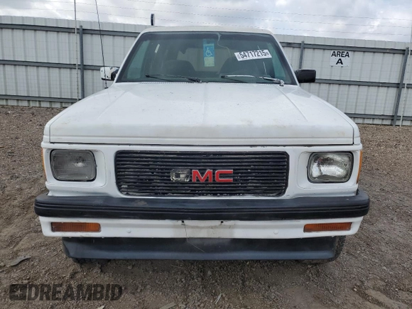 1994 GMC Jimmy Diamond Edition Luxury z VIN 1GKDT13W5R2503916, wystawiony jako Copart lot #54717215 z przebiegiem 99 991 mil mil oraz Szkoda całkowita • Salvage title. Historia ofert i sprzedaży dostępna na DreamBid. Obrazek 5.