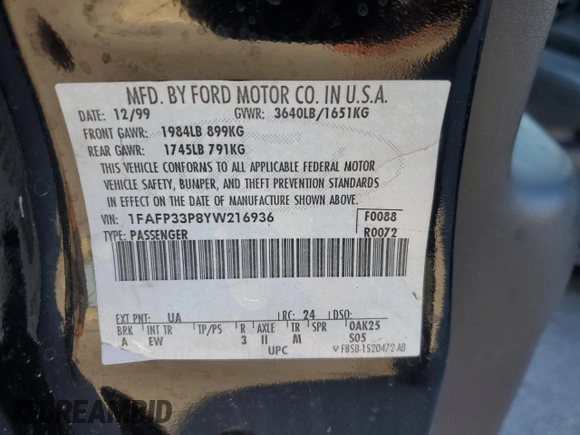 2000 Ford Focus LX with VIN 1FAFP33P8YW216936, listed as a Copart auction lot 83038404 with 120,298 mi miles and Salvage Title. Bid and sale history available at DreamBid. Image 12.