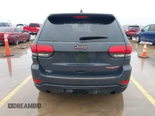 2018 Jeep Grand Cherokee Trailhawk with VIN 1C4RJFLG6JC320763, listed as a IAAI auction lot 41871683 with 115,417 mi miles and . Bid and sale history available at DreamBid. Image 16.