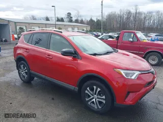 2016 Toyota RAV4 LE with VIN JTMBFREV2GJ097058, listed as a IAAI auction lot 41720372 with 118,606 mi miles. Bid and sale history available at carsss.com. Image 1.