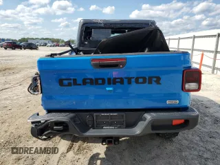 2020 Jeep Gladiator Overland z VIN 1C6HJTFG4LL162262, wystawiony jako Copart lot #57261325 z przebiegiem 74 856 mil mil oraz Szkoda całkowita • Salvage title. Historia ofert i sprzedaży dostępna na DreamBid. Obrazek 6.