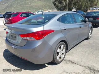 2013 Hyundai Elantra Limited with VIN KMHDH4AE9DU711301, listed as a IAAI auction lot 41845959 with 173,651 mi miles. Bid and sale history available at carsss.com. Image 4.