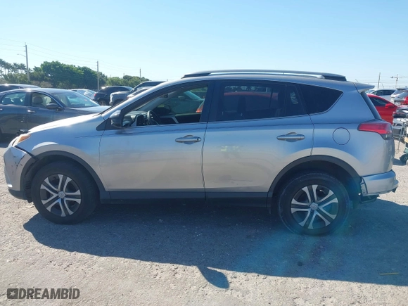 2018 Toyota RAV4 LE with VIN JTMZFREVXJJ196183, listed as a IAAI auction lot 41776107 with 82,713 mi miles. Bid and sale history available at carsss.com. Image 15.