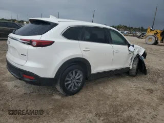 2020 Mazda CX-9 Sport z VIN JM3TCABY6L0413940, wystawiony jako Copart lot #39110534 z przebiegiem 20 881 mil mil oraz . Historia ofert i sprzedaży dostępna na DreamBid. Obrazek 3.