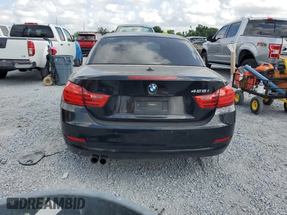 2014 BMW 4 Series 428i z VIN WBA3V5C52EP751180, wystawiony jako Copart lot #52514525 z przebiegiem 105 812 mil mil oraz Szkoda całkowita • Salvage title. Historia ofert i sprzedaży dostępna na DreamBid. Obrazek 6.