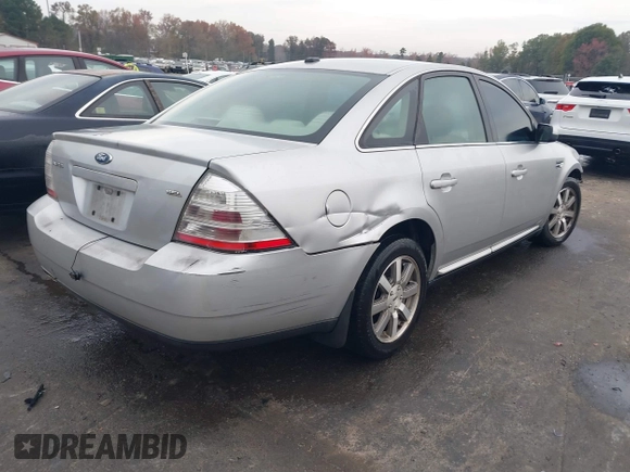 2009 Ford Taurus SEL with VIN 1FAHP24W39G102833, listed as a IAAI auction lot 40892334 with 288,418 mi miles. Bid and sale history available at carsss.com. Image 4.