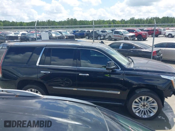 2019 Cadillac Escalade Platinum with VIN 1GYS4DKJ9KR138333, listed as a IAAI auction lot 42523430 with 104,787 mi miles and . Bid and sale history available at DreamBid. Image 13.