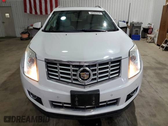 2016 Cadillac SRX Performance Collection with VIN 3GYFNCE36GS525836, listed as a Copart auction lot 84502634 with 94,639 mi miles and Salvage title. Bid and sale history available at DreamBid. Image 5.