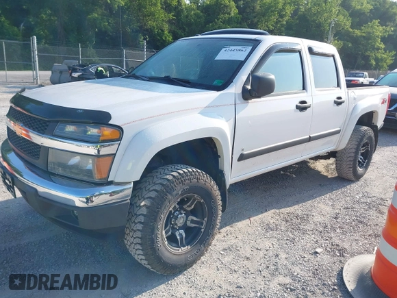 2007 Chevrolet Colorado 1LT z VIN 1GCDT13E978249656, wystawiony jako IAAI lot #42445862 z przebiegiem 115 298 mil mil oraz . Historia ofert i sprzedaży dostępna na DreamBid. Obrazek 17.
