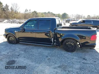 2002 Ford F-150 Harley Davidson with VIN 1FTRW07312KC24102, listed as a IAAI auction lot 41591917 with 1 mi miles. Bid and sale history available at carsss.com. Image 15.