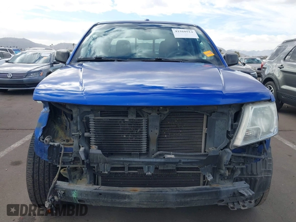 2014 Nissan Frontier SV with VIN 1N6AD0ER1EN765693, listed as a IAAI auction lot 41560914 with 165,572 mi miles and . Bid and sale history available at DreamBid. Image 13.