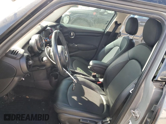 2016 MINI Hardtop 4 Door with VIN WMWXU1C55G2D09641, listed as a Copart auction lot 50567495 with 123,796 mi miles and Salvage Title. Bid and sale history available at DreamBid. Image 7.