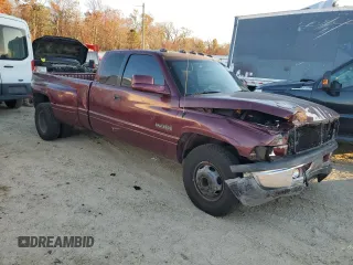 2001 Dodge Ram 3500 with VIN 1B7MC33671J599792, listed as a Copart auction lot 80102234 with 261,354 mi miles and Salvage Title. Bid and sale history available at carsss.com. Image 4.