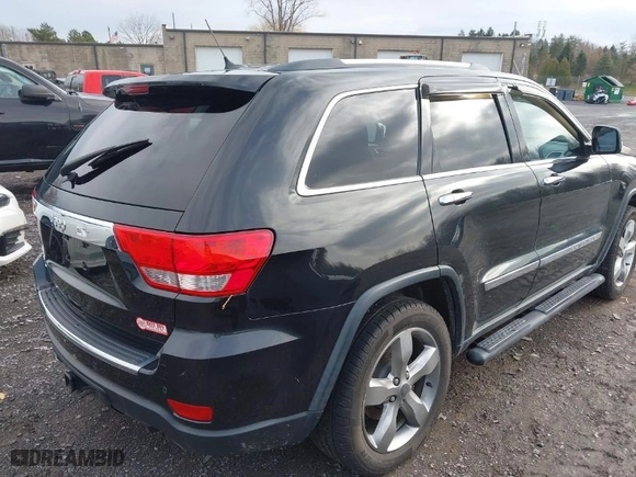 2013 Jeep Grand Cherokee Limited with VIN 1C4RJFBT9DC592257, listed as a IAAI auction lot 40955180 with 130,038 mi miles. Bid and sale history available at carsss.com. Image 4.