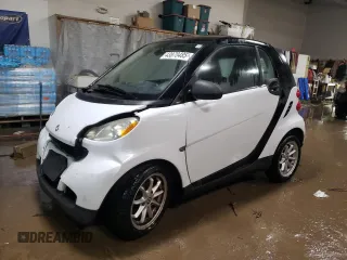 2009 Smart fortwo Pure with VIN WMEEJ31X69K258431, listed as a Copart auction lot 43870485 with 64,935 mi miles and Salvage Title. Bid and sale history available at carsss.com. Image 1.