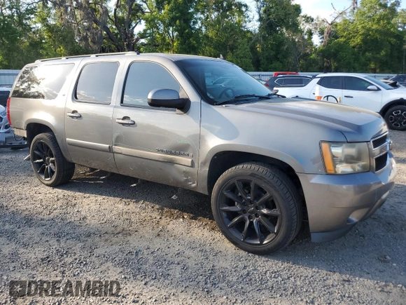 2007 Chevrolet Suburban LS with VIN 1GNFC16097J403193, listed as a Copart auction lot 51236075 with 191,350 mi miles and Salvage title. Bid and sale history available at DreamBid. Image 4.