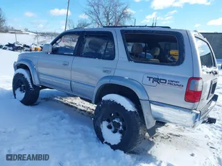1998 Toyota 4Runner Limited with VIN JT3HN87R2W0184698, listed as a IAAI auction lot 41710285 with 176,068 mi miles. Bid and sale history available at carsss.com. Image 3.