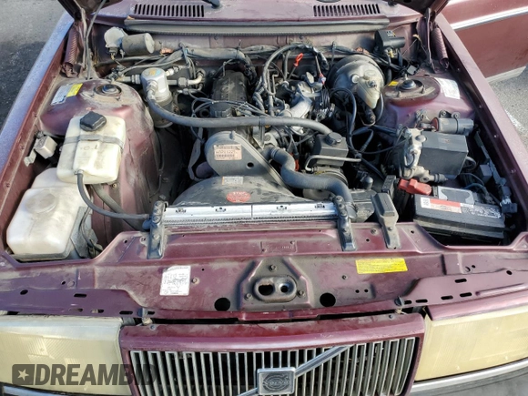 1993 Volvo 240 z VIN YV1AS8801P1487953, wystawiony jako Copart lot #77392634 z przebiegiem 270 844 mil mil oraz Szkody całkowita. Historia ofert i sprzedaży dostępna na DreamBid. Obrazek 11.