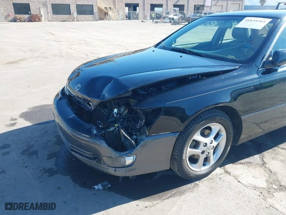 2000 Lexus ES 300 with VIN JT8BF28G2Y5093962, listed as a IAAI auction lot 41634264 with 106,951 mi miles. Bid and sale history available at carsss.com. Image 6.