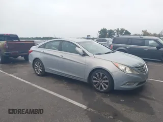 2013 Hyundai Sonata Limited with VIN 5NPEC4AC7DH579641, listed as a IAAI auction lot 40852052 with 208,950 mi miles and . Bid and sale history available at carsss.com. Image 1.
