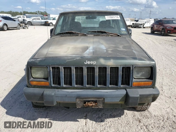 1997 Jeep Cherokee SE with VIN 1J4FT28SXVL540135, listed as a Copart auction lot 77043714 with 0 mi miles and Clean Title. Bid and sale history available at carsss.com. Image 5.