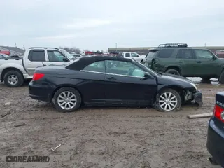 2010 Chrysler Sebring Touring with VIN 1C3BC5ED9AN138508, listed as a IAAI auction lot 41711330 with 93,877 mi miles. Bid and sale history available at carsss.com. Image 13.