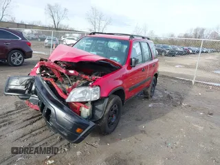 1999 Honda CR-V LX with VIN JHLRD1843XC022059, listed as a IAAI auction lot 41952836 with 199,589 mi miles. Bid and sale history available at carsss.com. Image 2.