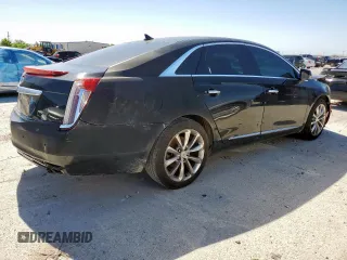 2014 Cadillac XTS Luxury z VIN 2G61M5S39E9302853, wystawiony jako Copart lot #57712215 z przebiegiem 180 886 mil mil oraz Czysty tytuł • Clean title. Historia ofert i sprzedaży dostępna na DreamBid. Obrazek 3.