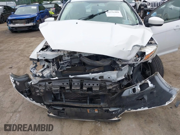2018 Ford Focus SE z VIN 1FADP3F24JL247003, wystawiony jako IAAI lot #42531969 z przebiegiem 55 344 mil mil oraz . Historia ofert i sprzedaży dostępna na DreamBid. Obrazek 6.