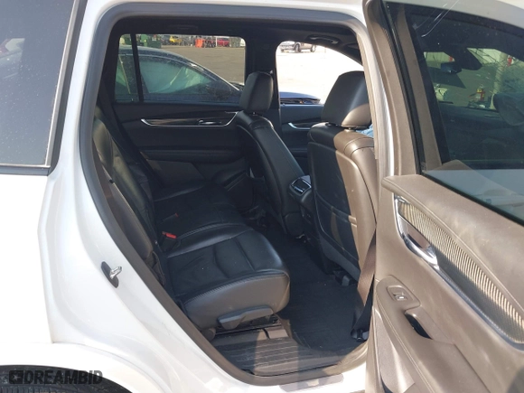 2020 Cadillac XT6 AWD Sport with VIN 1GYKPGRS5LZ115883, listed as a IAAI auction lot 39995097 with 68,589 mi miles. Bid and sale history available at carsss.com. Image 8.