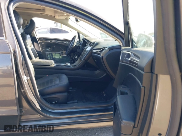 2017 Ford Fusion Hybrid SE с VIN 3FA6P0LU7HR110436, выставлен на аукционе IAAI как лот 42669395 с пробегом 104 472 миль миль и . История ставок и продаж доступна на DreamBid. Изображение 5.
