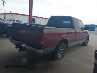2003 Ford F-150 XL with VIN 1FTRX17L63NB64675, listed as a IAAI auction lot 42577516 with Not provided miles and . Bid and sale history available at DreamBid. Image 4.