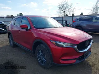 2019 Mazda CX-5 Touring with VIN JM3KFBCMXK1658009, listed as a IAAI auction lot 42028300 with 33,419 mi miles. Bid and sale history available at carsss.com. Image 1.