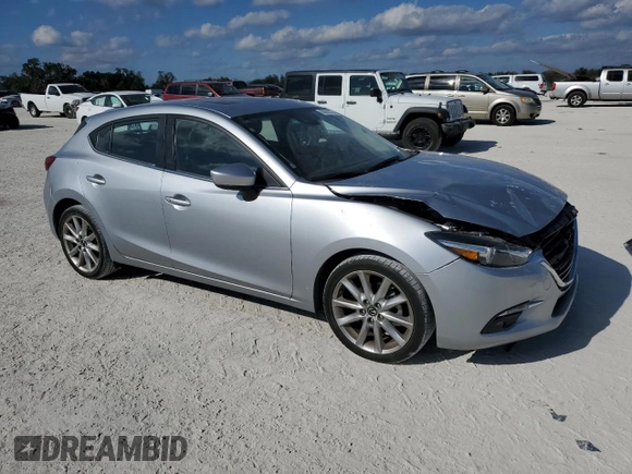 2017 Mazda 3 Grand Touring with VIN JM1BN1M33H1105397, listed as a Copart auction lot 86052334 with 21,578 mi miles and Salvage Title. Bid and sale history available at DreamBid. Image 4.