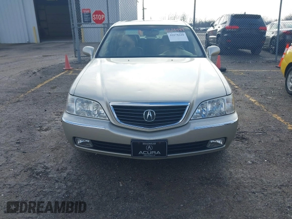 2004 Acura RL w/Navigation System z VIN JH4KA96664C001291, wystawiony jako IAAI lot #41678449 z przebiegiem 83 954 mil mil oraz . Historia ofert i sprzedaży dostępna na DreamBid. Obrazek 6.