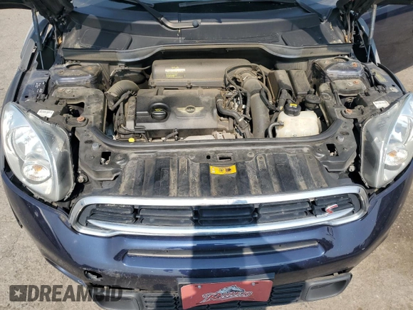 2015 MINI Countryman S z VIN WMWZC5C54FWP48739, wystawiony jako Copart lot #58197575 z przebiegiem 119 816 mil mil oraz Szkoda całkowita • Salvage title. Historia ofert i sprzedaży dostępna na DreamBid. Obrazek 11.