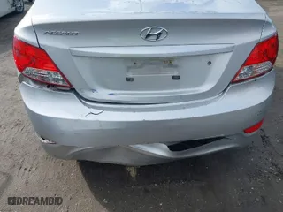 2014 Hyundai Accent GLS with VIN KMHCT4AE6EU613452, listed as a IAAI auction lot 41741747 with 133,672 mi miles. Bid and sale history available at carsss.com. Image 6.