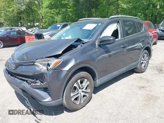 2016 Toyota RAV4 LE with VIN JTMZFREV7GJ086149, listed as a IAAI auction lot 42064251 with 90,104 mi miles and . Bid and sale history available at DreamBid. Image 2.